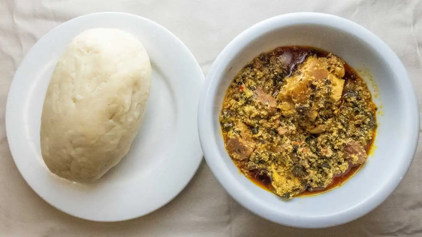 Egusi with Assorted Meat - Signature West African dish at Atiga Restaurant Winnipeg